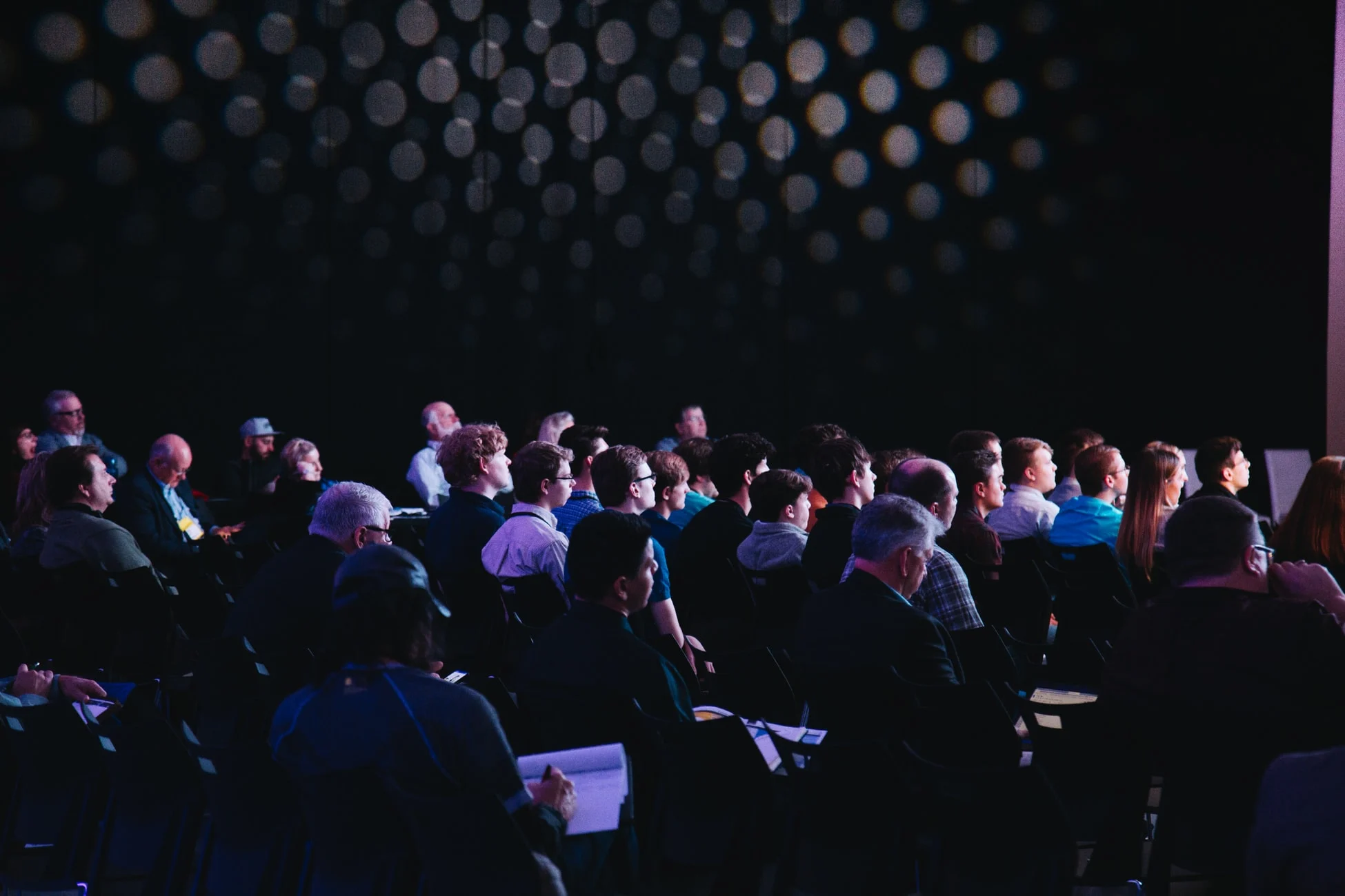 Audience attending a business presentation