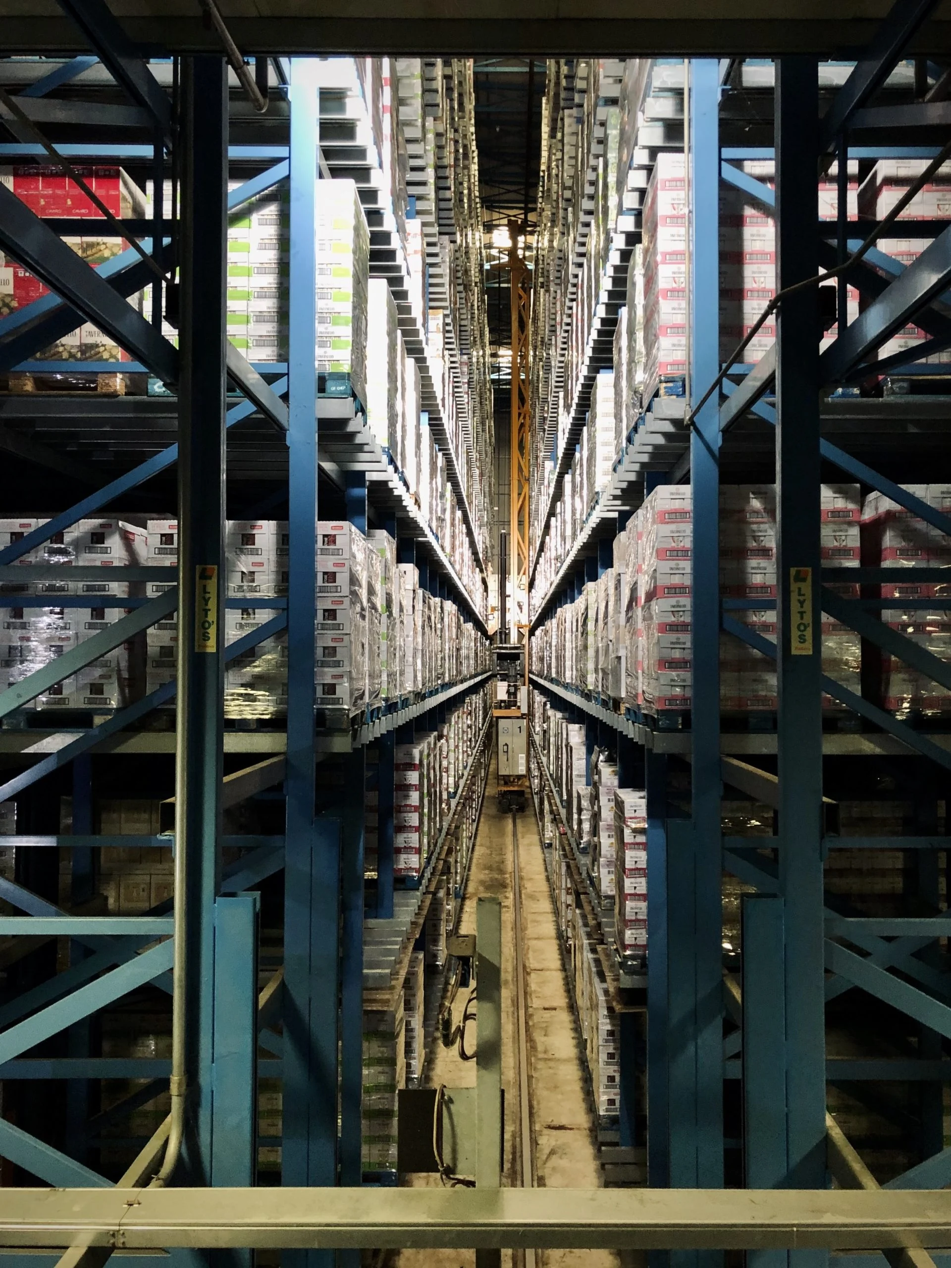 Tall warehouse racks filled with inventory