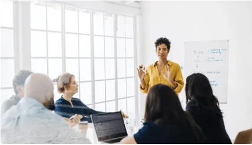 Facilitator presenting to a business team